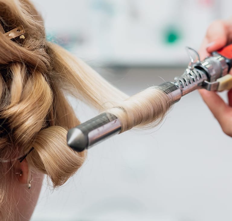 straightening and curling of blonde hair